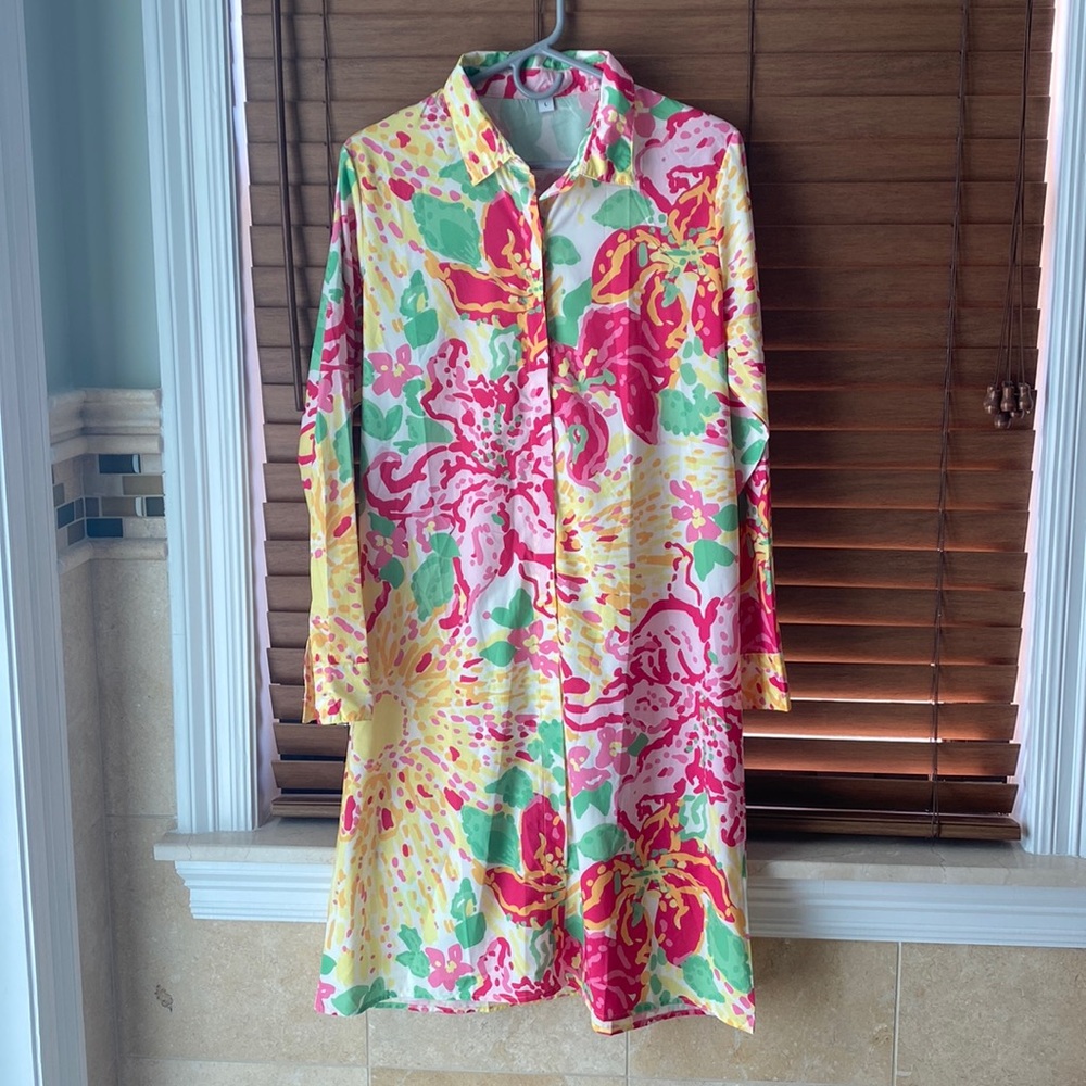 Flowered woman’s button down beach cover up